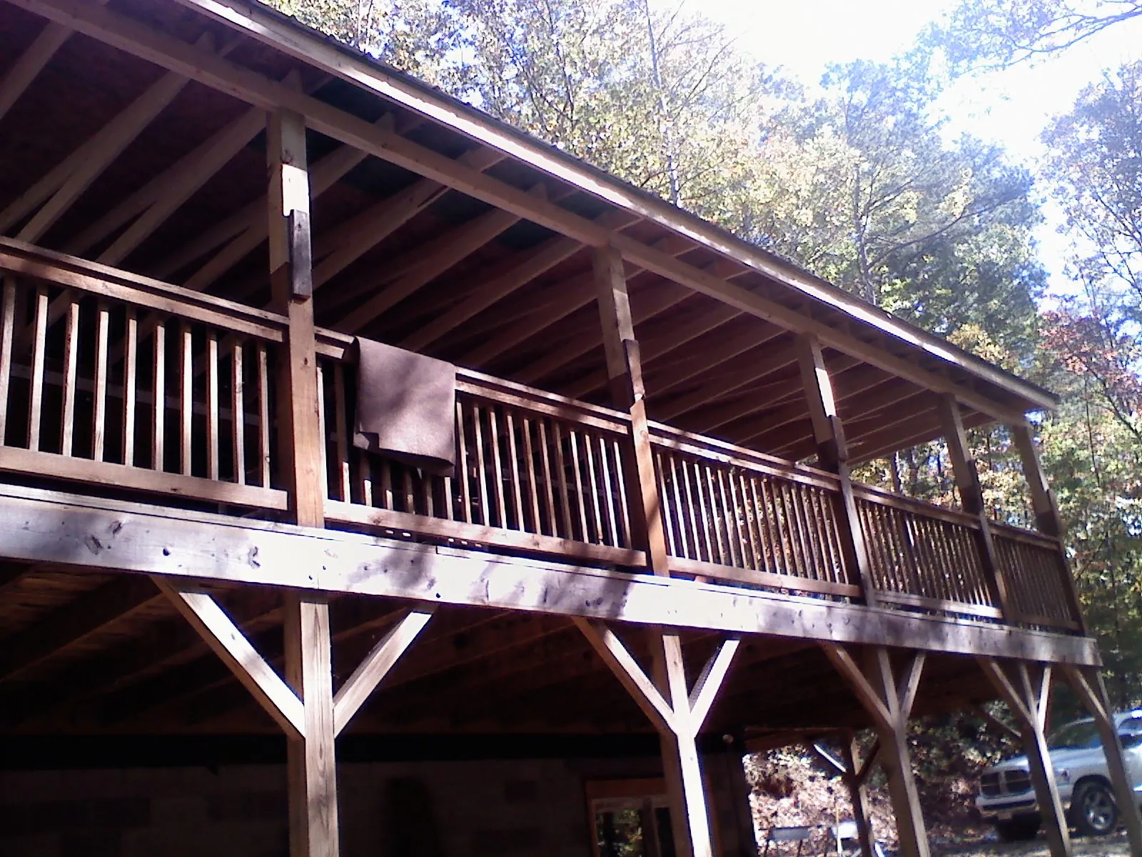 Timber framing under a new elevated porch and deck — Roof Leak Repair in Graceville by Roofing Brothers